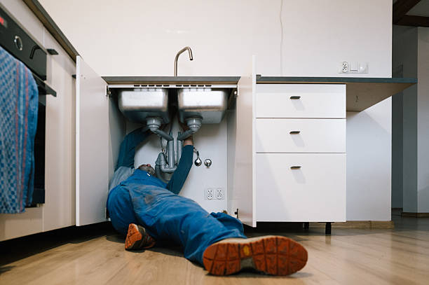 Professional Drain Cleaning technician working in Monroe City, MO